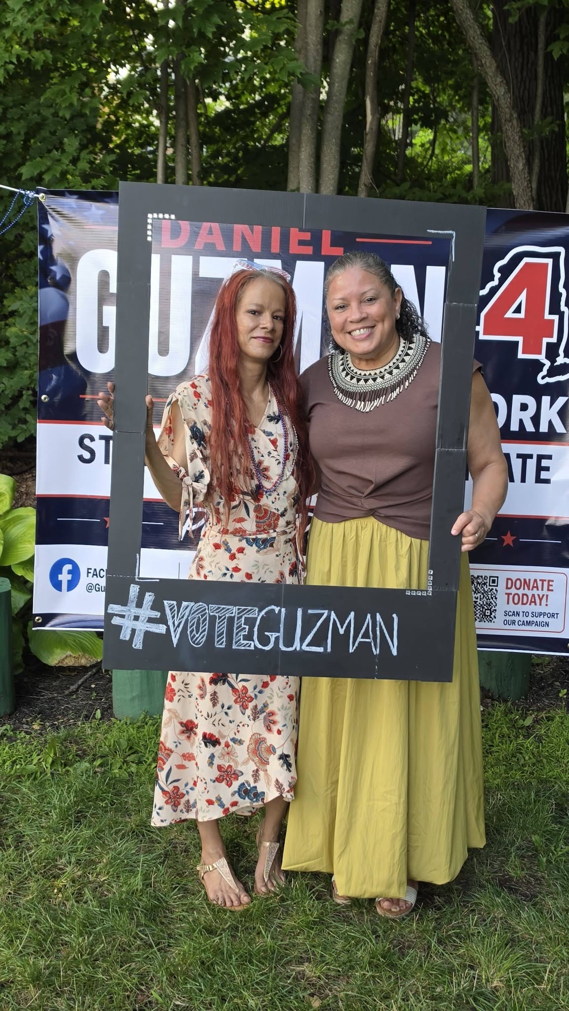 Daniel Guzman with community members at a campaign event
