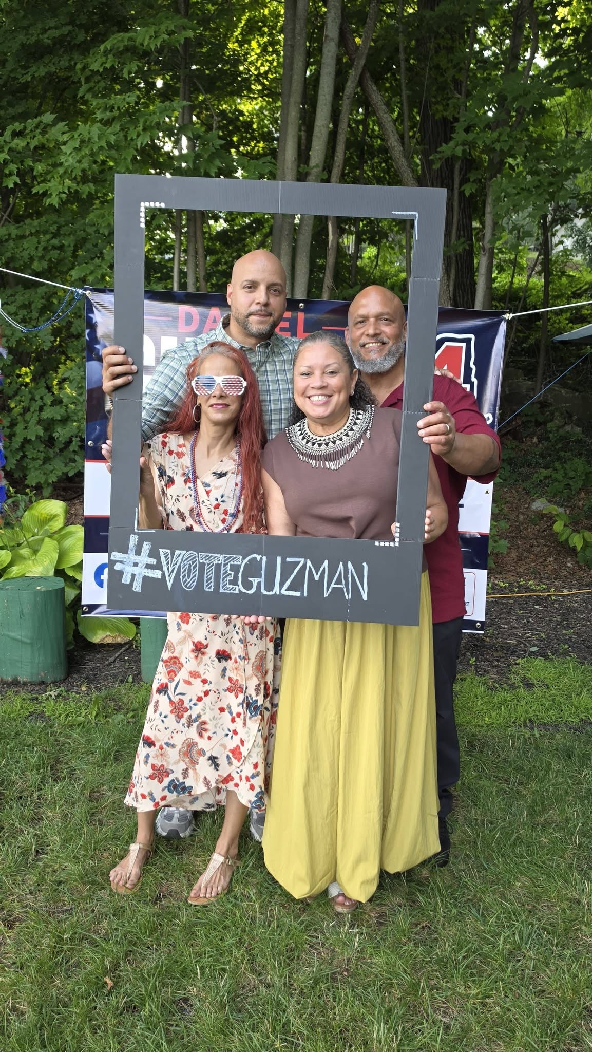 Daniel Guzman with community members at a campaign event